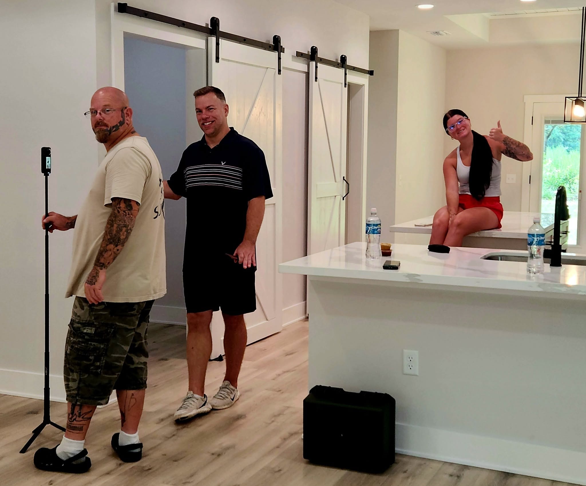 Jason, Josh, and Mariah during a team training day inside a property